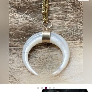 Gold And Mother Of Pearl Double Horned Charm